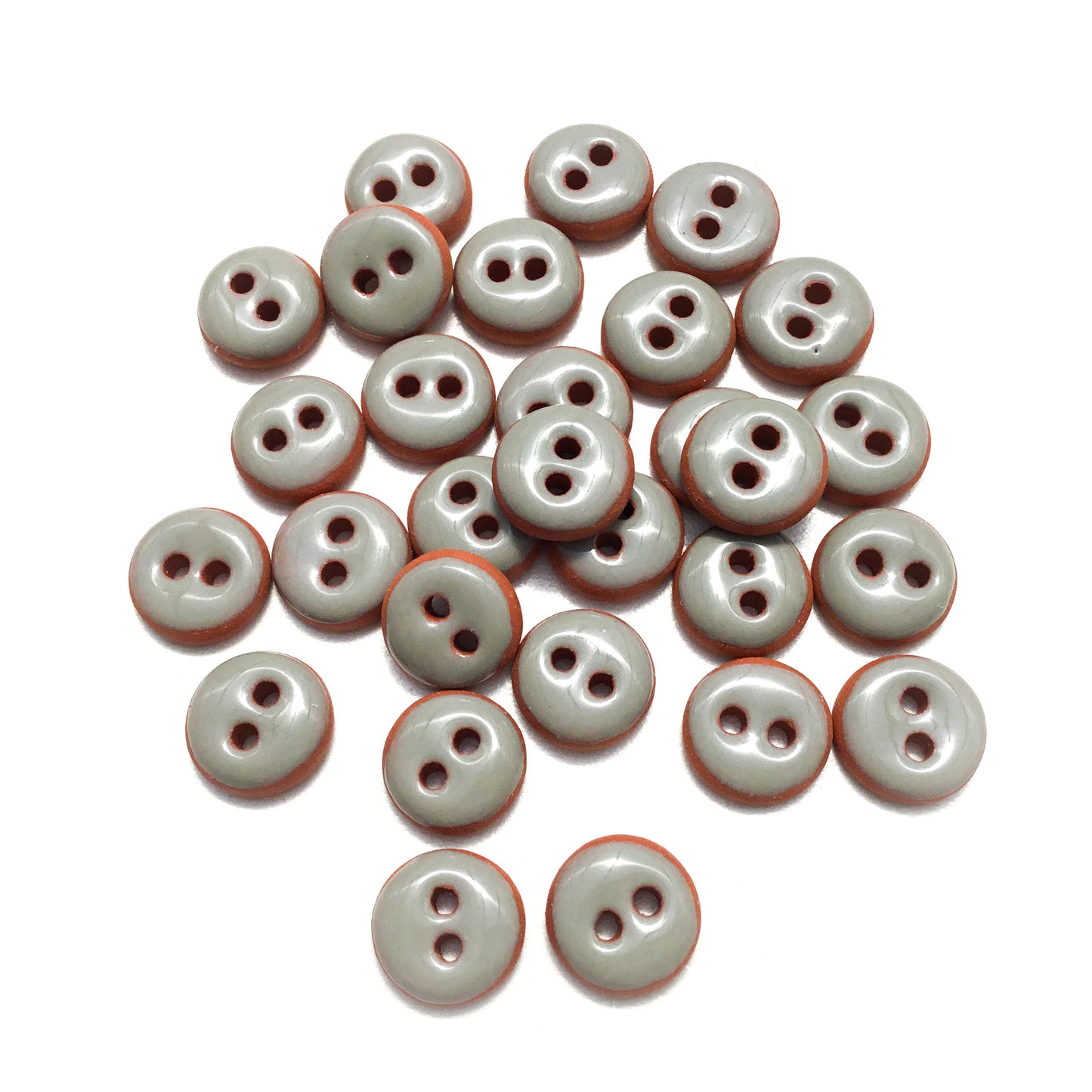 Gray Ceramic Buttons on Red Clay - 7/16"