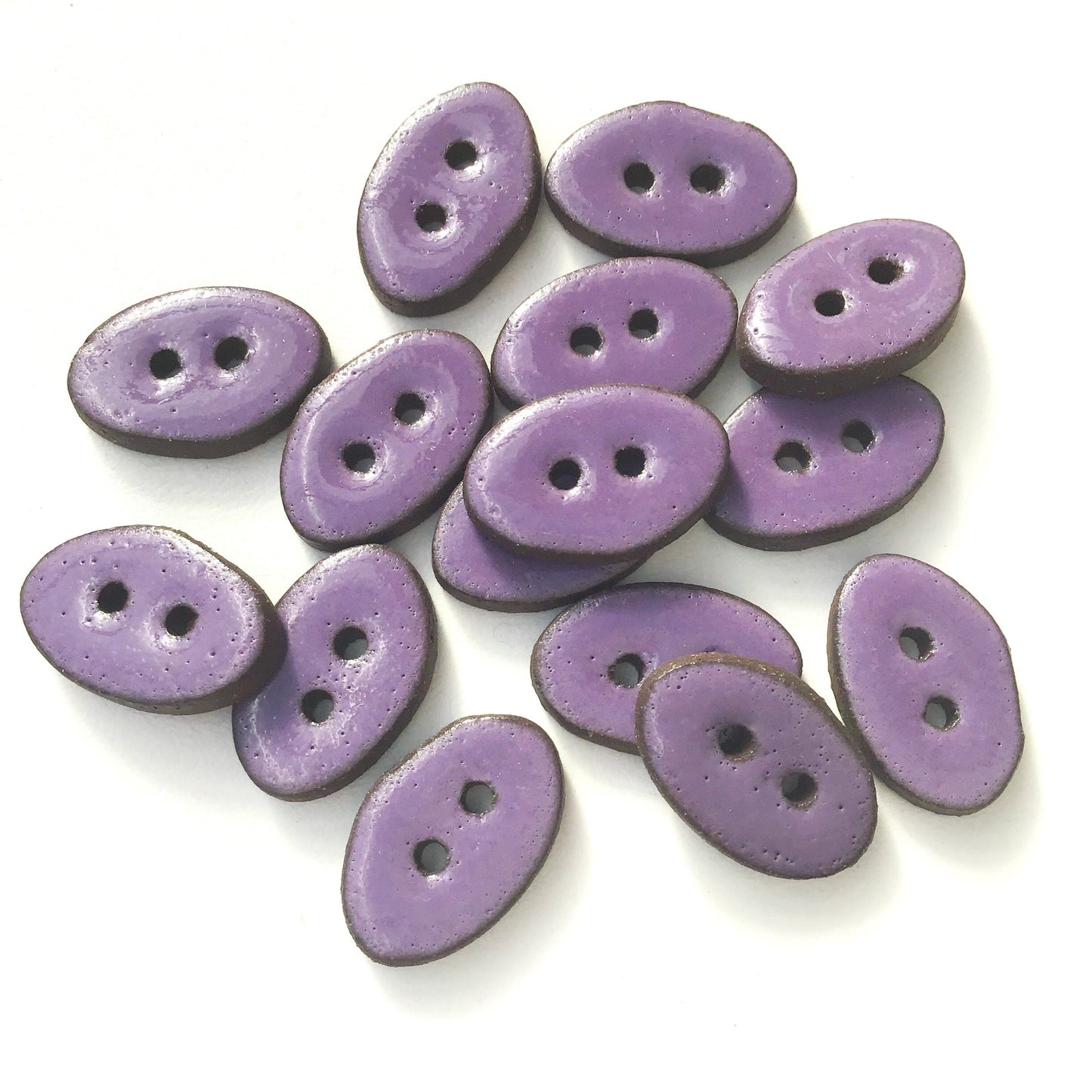Purple Oval Clay Buttons on Black Clay - 1/2" x 3/4" (ws-175)