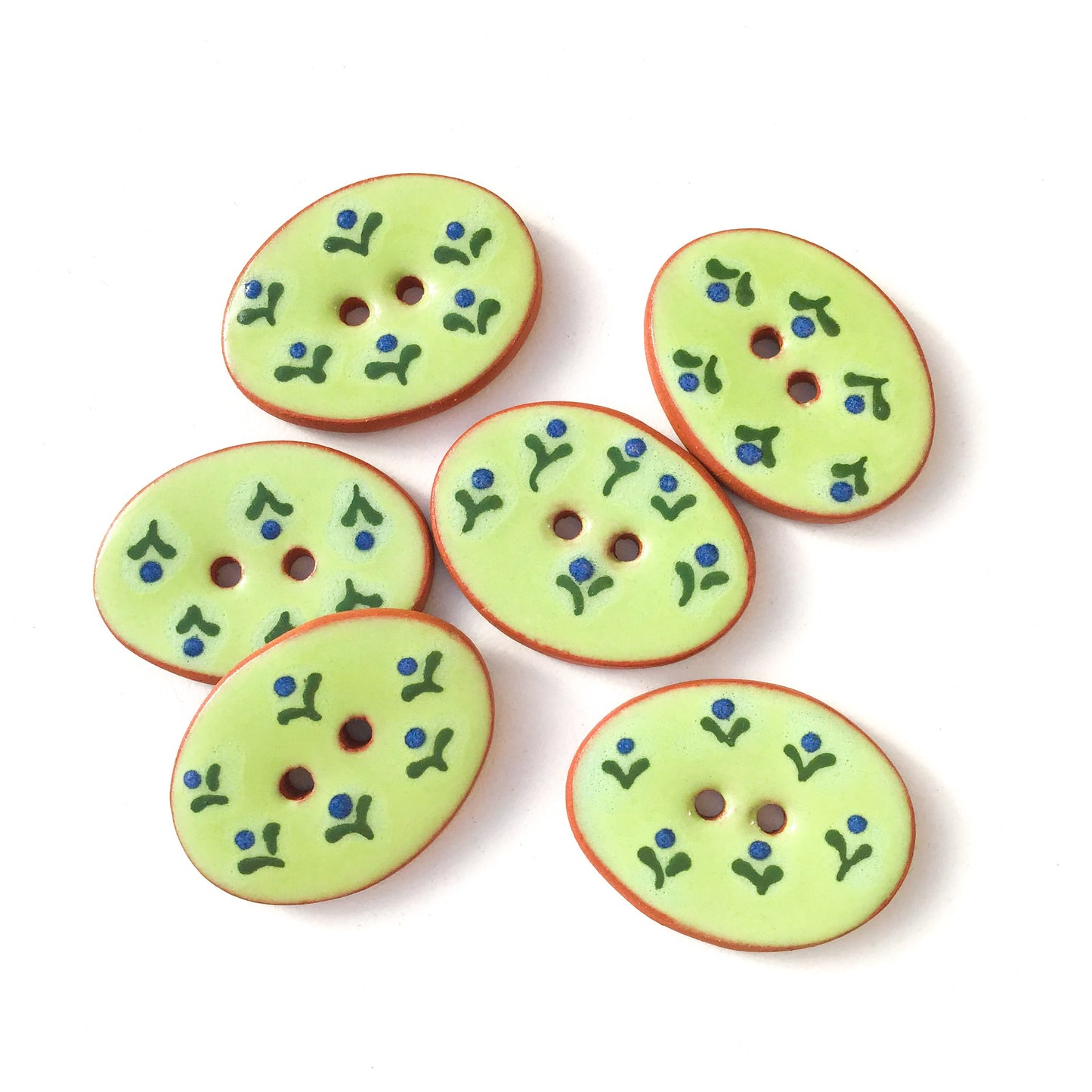 Green Ceramic Buttons with Small Blue Flowers 3/4" x 1-1/16"